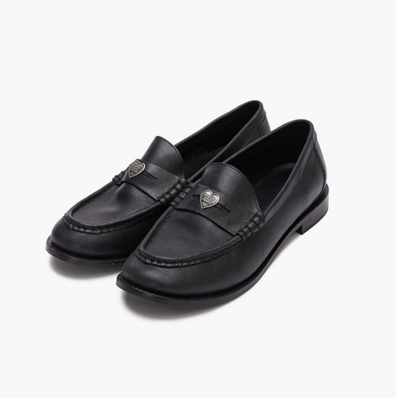 461. MARGE SHERWOOD MARGE HEART PULL-UP LOAFERS Black $455...